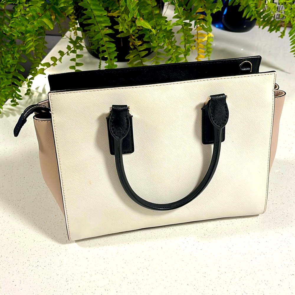 Kate Spade New York cute, adorable, sexy satchel bag. It is Black, white & Beige